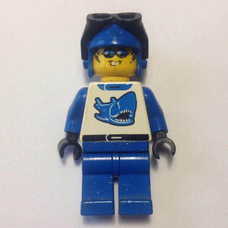 fig-000246 – Racer, Blue and White Outfit with Shark, Blue Hat with Goggles