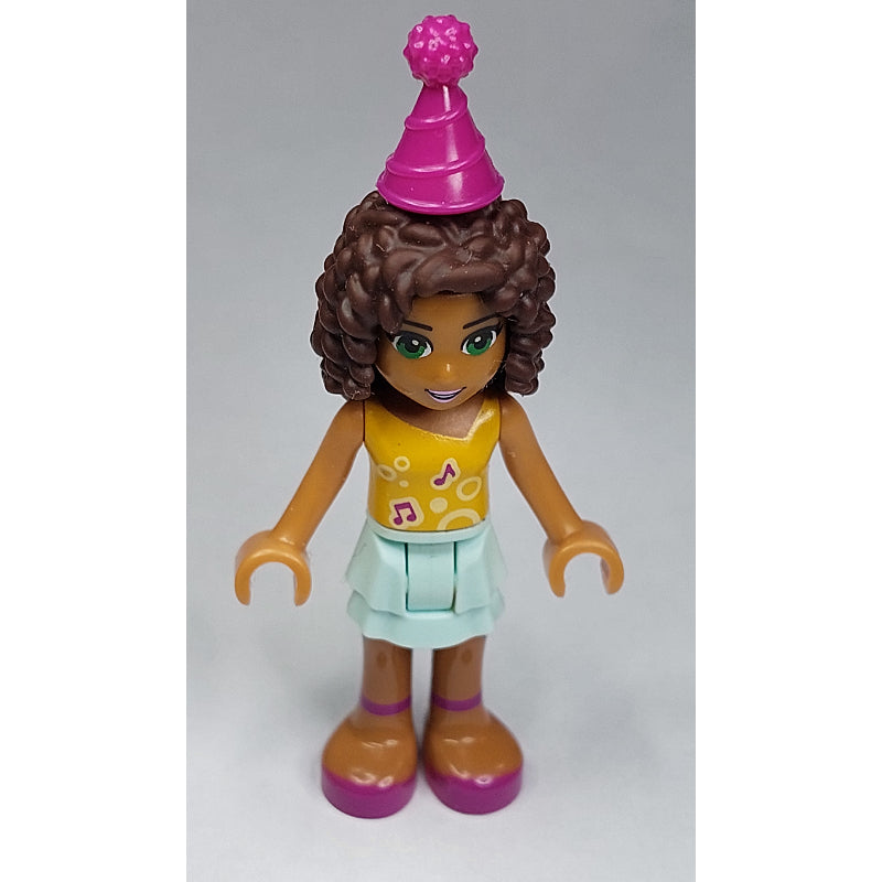 fig-000302 – Andrea - Bright Light Orange Top, Light Aqua Skirt, Magenta Party Hat