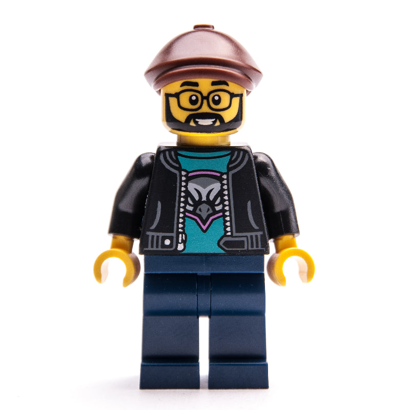 fig-000618 – Man, Black Jacket, Dark Blue Legs, Reddish Brown Flat Cap