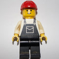 fig-000675 – Man, Black Overalls, Red Hard Hat (3626a Head)