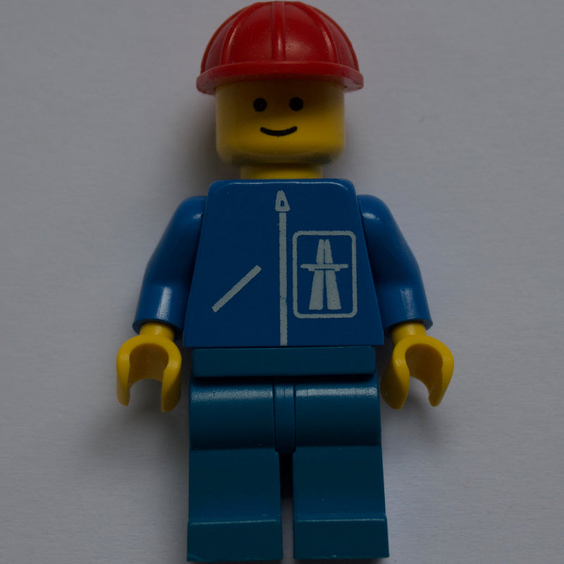 fig-000714 – Construction Worker, Blue Jacket with Highway Logo, Blue Legs, Red Hard Hat