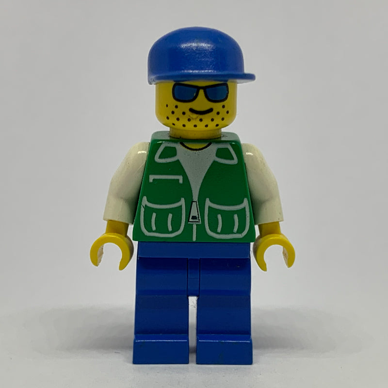 fig-000728 – Man, Green Jacket, Blue Legs, Blue Cap, Blue Sunglasses