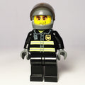 fig-000779 – Fireman, Black Fire Jacket with Reflective Stripes, Radio, and Badge, Dark Bluish Gray Helmet with Visor, Orange Sunglasses