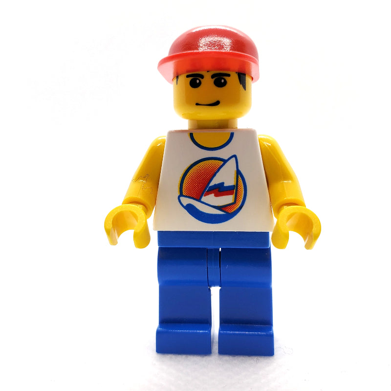 fig-000784 – Man, White Tank Top with Windsurfer, Blue Legs, Red Cap