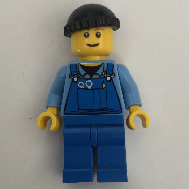 fig-000831 – Man, Blue Overalls over Shirt, Blue Legs, Black Hat, Reddish Brown Eyebrows