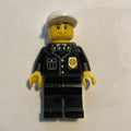 fig-001423 – Policeman, Black Suit with Badge, White Cap, Stubble