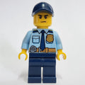 fig-001585 – Policeman, Bright Light Blue Shirt with Dark Blue Tie, Badge, and Radio on Belt, Dark Blue Cap