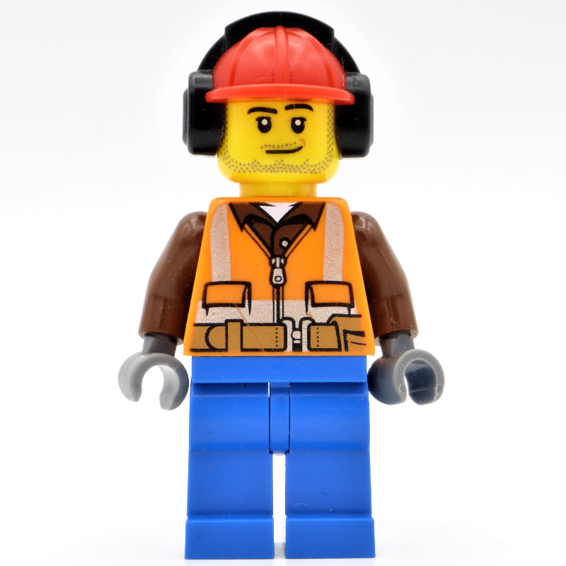 fig-001664 – Construction Worker, Orange Safety Vest with Zipper over Reddish Brown Shirt, Dark Tan Legs, Red Hard Hat with Ear Defenders, Stubble