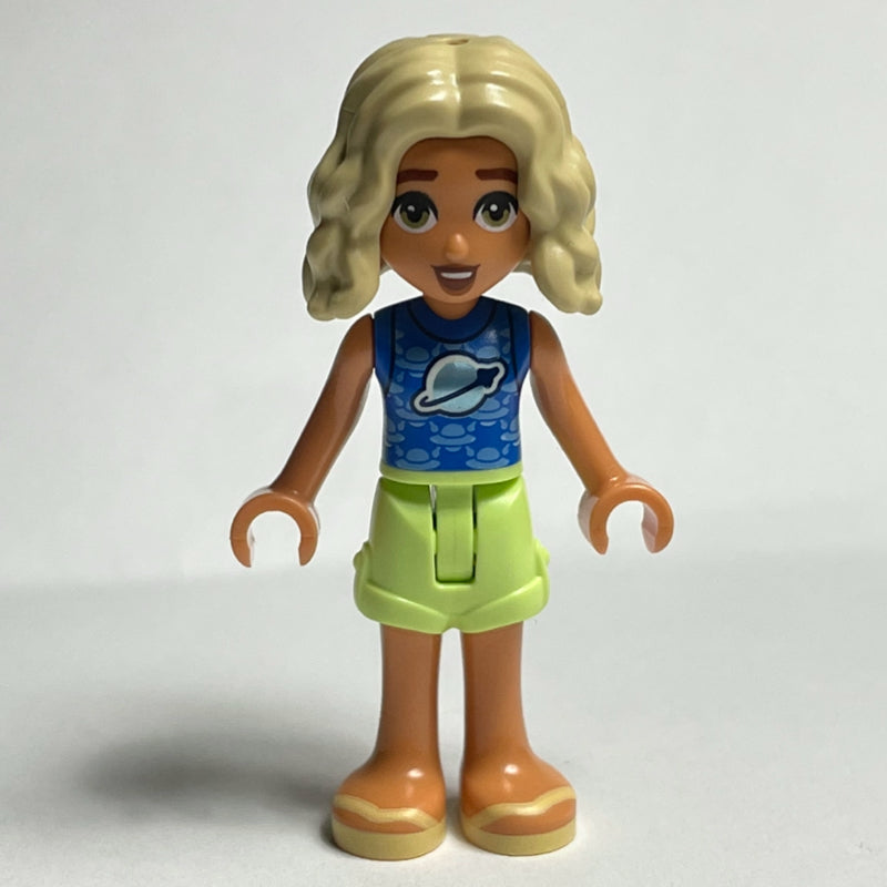 fig-001725 – Nova - Blue Top, Tan Shorts