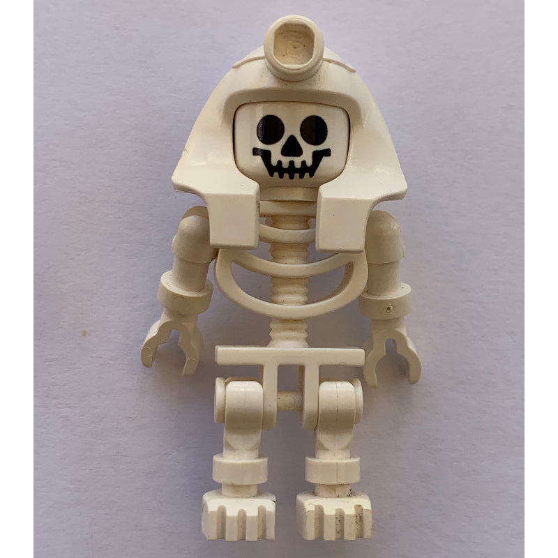 fig-002232 – Skeleton, Standard Face, Mummy Headdress, White