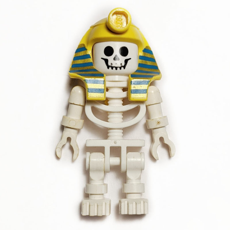 fig-002235 – Skeleton, Standard Face, Mummy Headdress, Blue and Gold Stripes