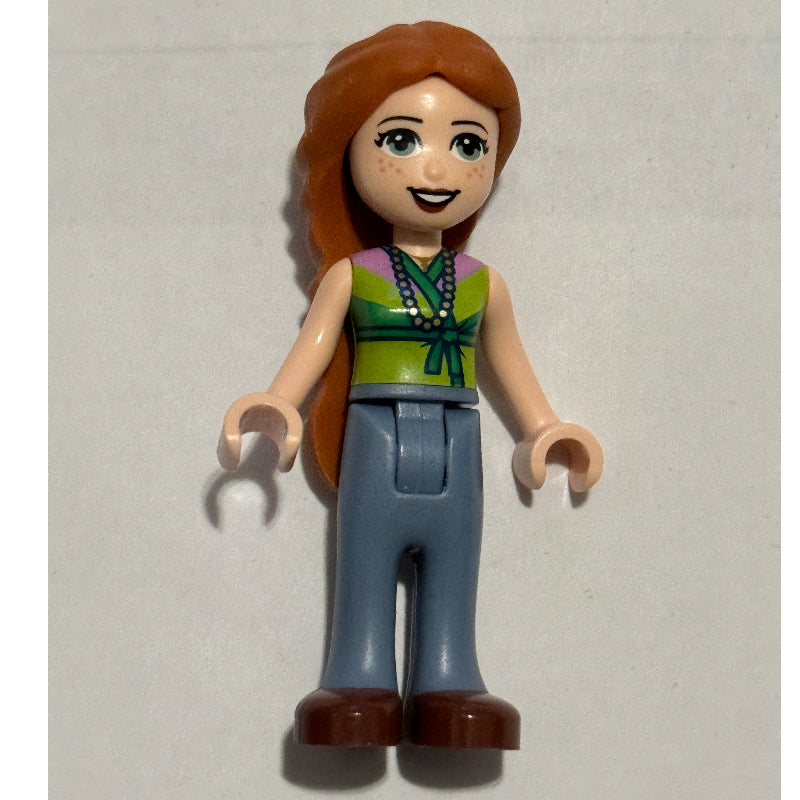 fig-002669 – Ann - Green/Lime Vest, Sand Blue Trousers