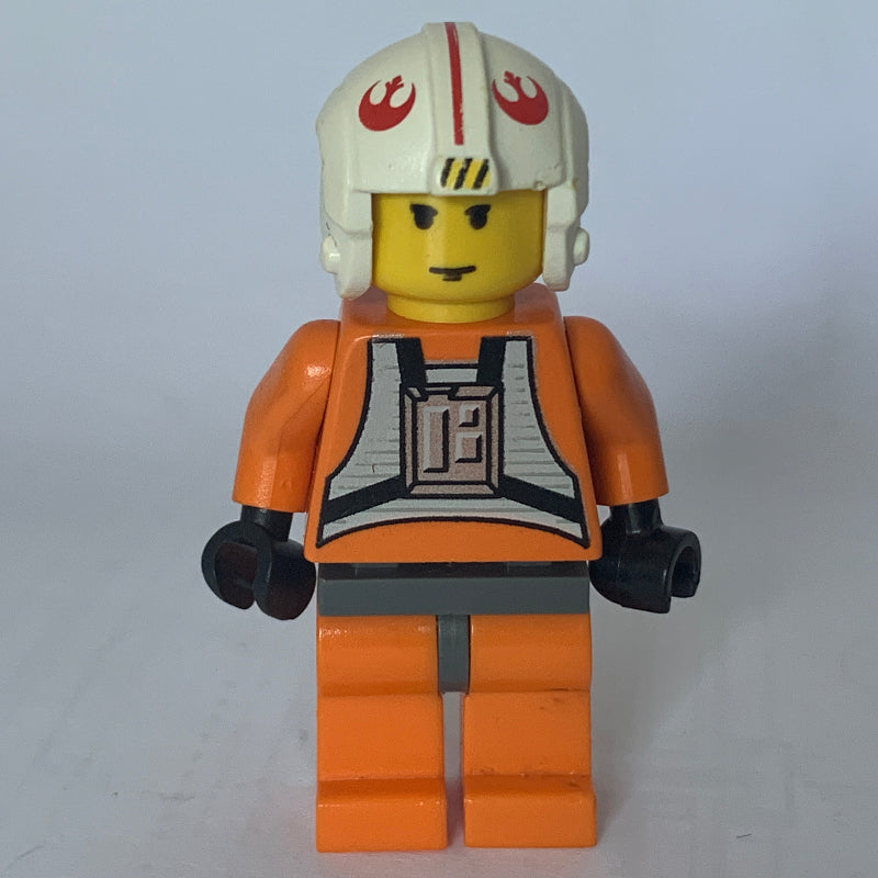 fig-003527 – Luke Skywalker, Orange Rebel Pilot Outfit, Yellow Skin, Dark Bluish Gray Hips (3626b Head)
