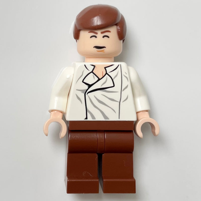 fig-003931 – Han Solo, White Shirt, Reddish Brown Legs, Dual Sided Head Closed Mouth / Closed Eyes