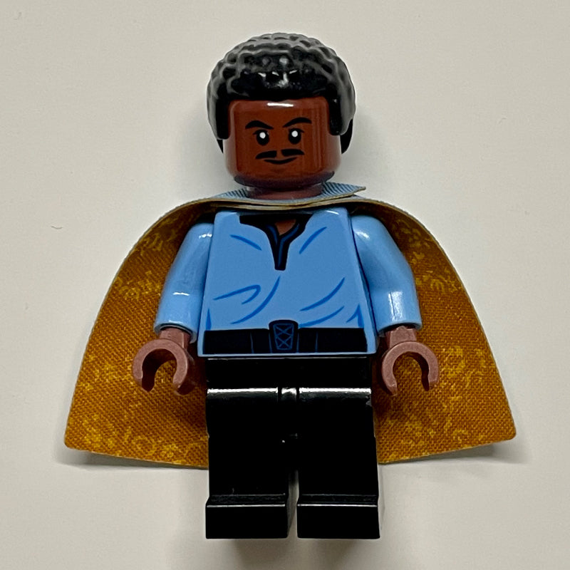 fig-004347 – Lando Calrissian, Sand Blue and Dark Orange Cape