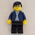 fig-004781 – Man - Dark Blue Jacket, Black Legs, Glasses