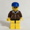 fig-004932 – Man - Brown Jacket, Yellow Legs, Blue Cap