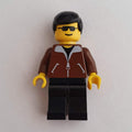 fig-004956 – Man - Brown Jacket, Dark Grey Legs