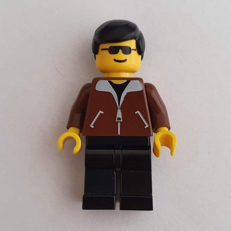 fig-004956 – Man - Brown Jacket, Dark Grey Legs