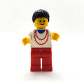 fig-005127 – Woman - White Torso, Yellow Necklace, Red Legs, Black Hair