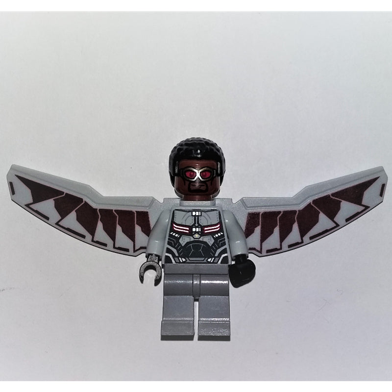 fig-005308 – Falcon with Light Bluish Gray and Dark Red Wings