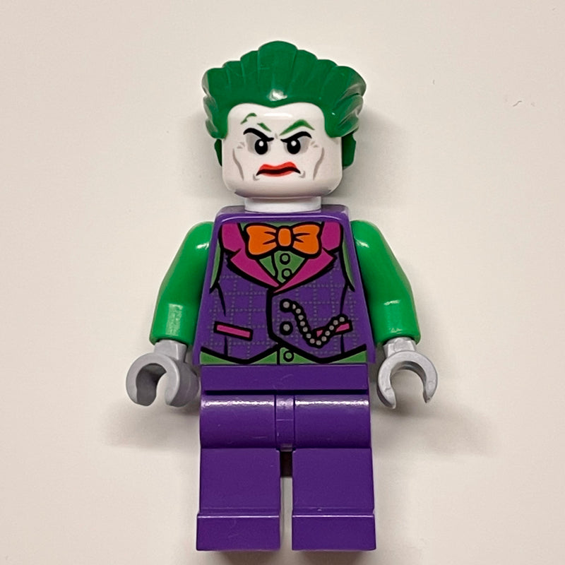 fig-005480 – The Joker with Dark Purple Vest Over Green Shirt and Orange Bow Tie