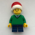 fig-006796 – Boy, Green Sweater, Short Dark Blue Legs, Santa Hat