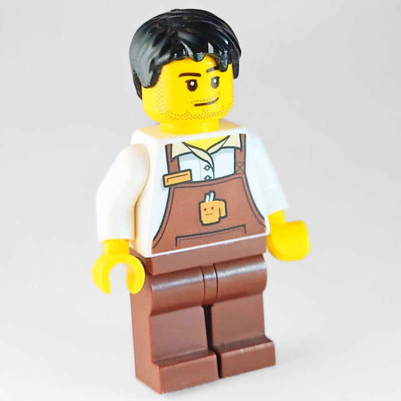 fig-006817 – Barista, Man, White Shirt, Reddish Brown Apron, Black Hair