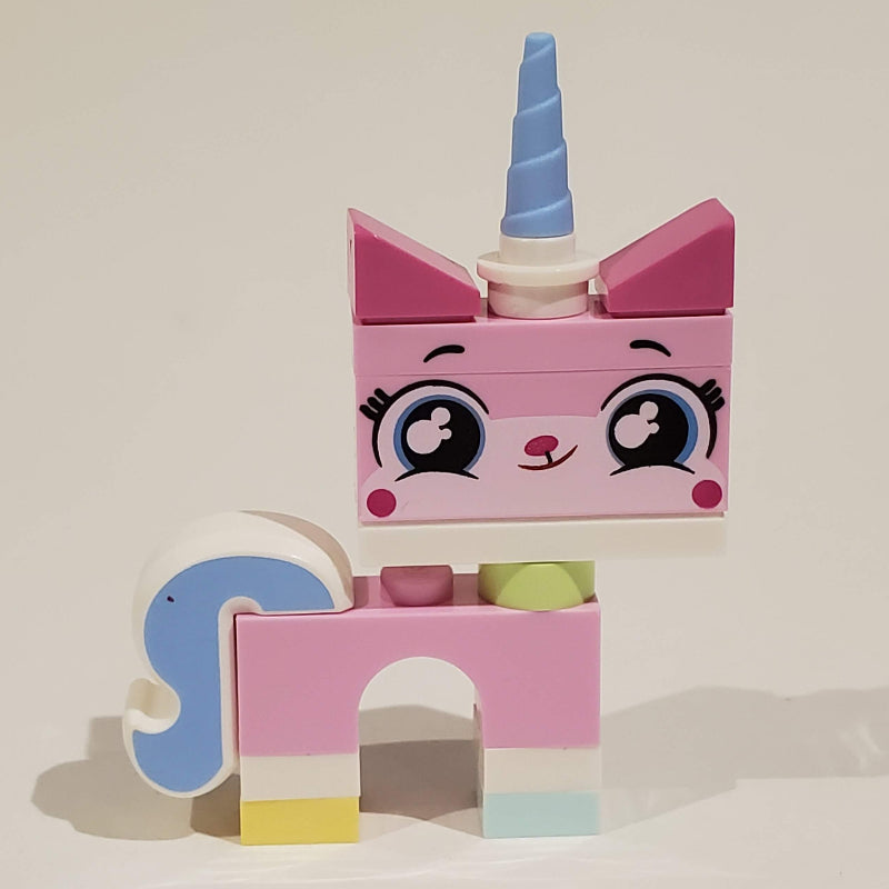 fig-007046 – Unikitty, Light Aqua Foot, Closed Mouth, Crescent Eyes