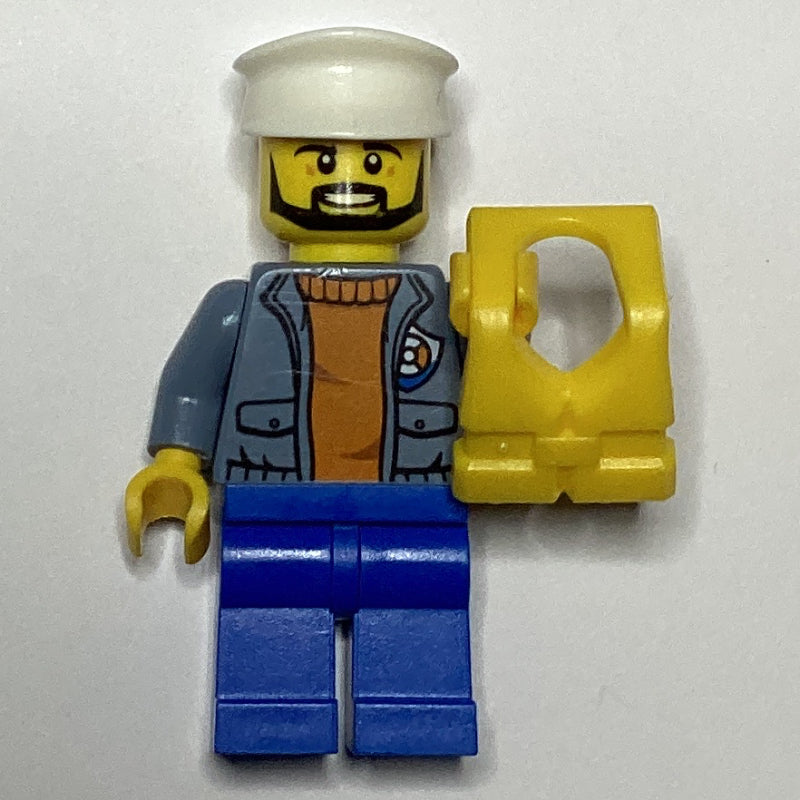 fig-007267 – Coast Guard, Open Sand Blue Jacket with Badge over Orange Sweater, White Hat, Yellow Life Vest, Beard