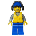 fig-007289 – Coast Guard, Light Bluish Gray Shirt with Badge, Blue Cap, Ear Defenders, Yellow Life Vest, Stubble