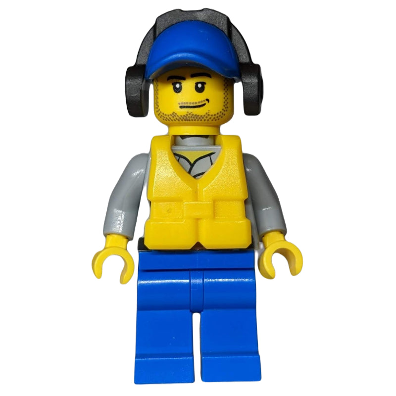 fig-007289 – Coast Guard, Light Bluish Gray Shirt with Badge, Blue Cap, Ear Defenders, Yellow Life Vest, Stubble