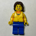 fig-007291 – Woman, Orange Halter Top with Flowers, Blue Legs, Yellow Life Vest, Dark Brown Hair