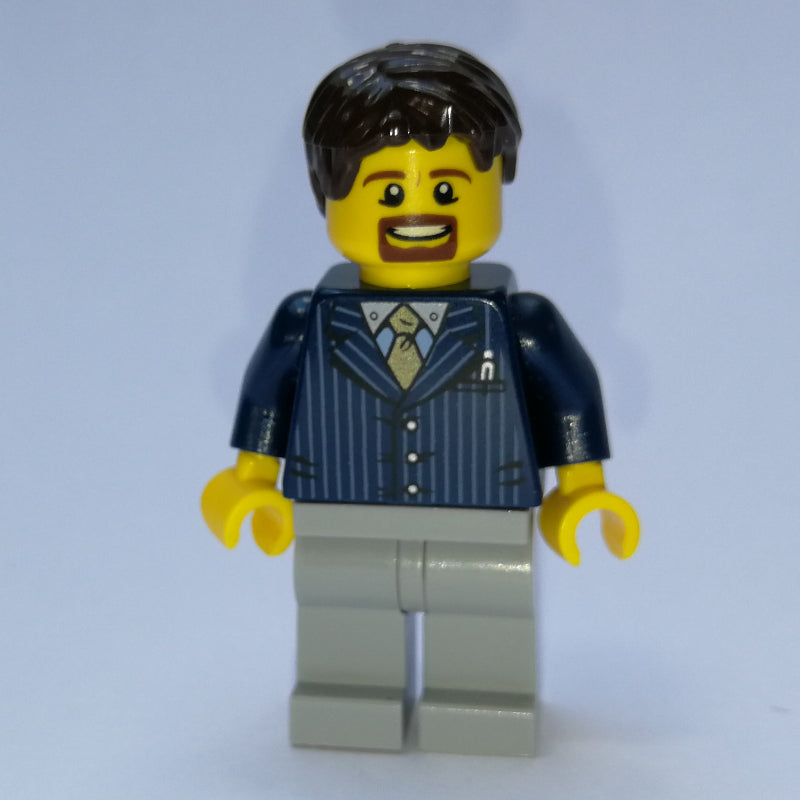 fig-007339 – Man, Dark Blue Pinstripe Suit with Gold Tie, Dark Brown Hair