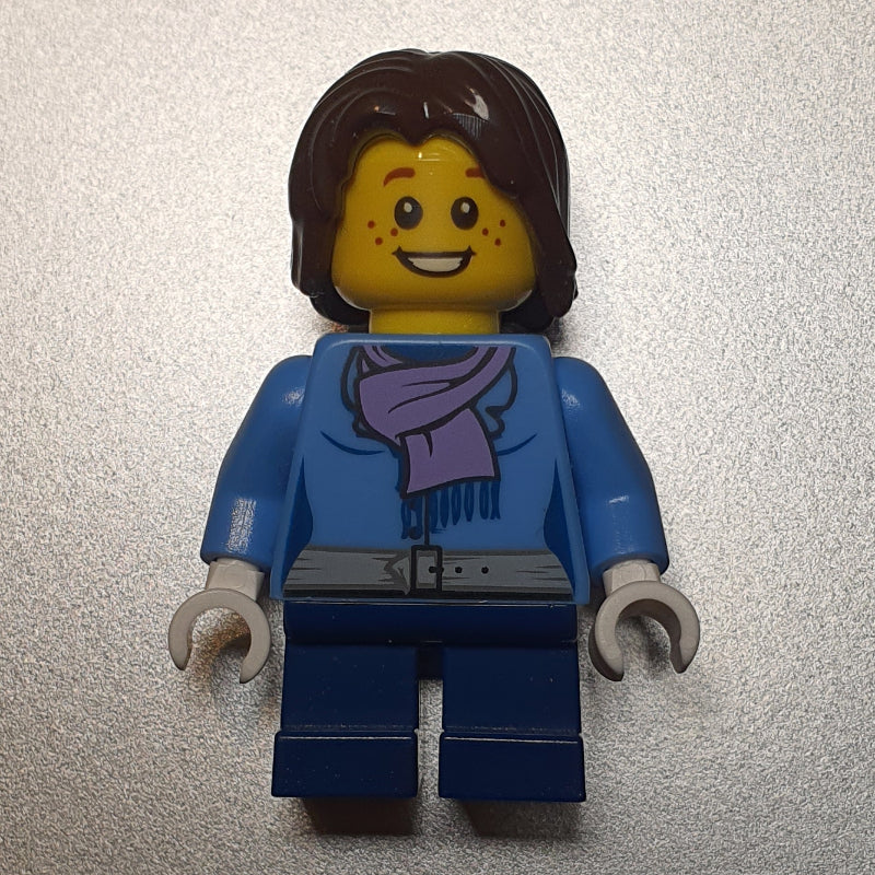 fig-007388 – Girl, Medium Blue Jacket with Medium Lavender Scarf, Short Dark Blue Legs, Dark Brown Hair