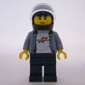 fig-007499 – Race Driver, Sand Blue Torso, Dark Blue Legs, Black Helmet, Dodge