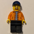 fig-007560 – Orange Torso, Black Legs, Dark Blue Cap