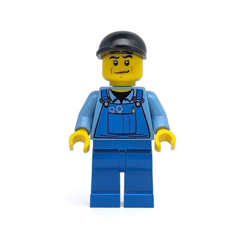 fig-007593 – Man, Blue Overalls over Shirt, Blue Legs, Black Cap