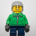 fig-007594 – Boy, Green Jacket, Short Dark Blue Legs, Light Bluish Gray Helmet