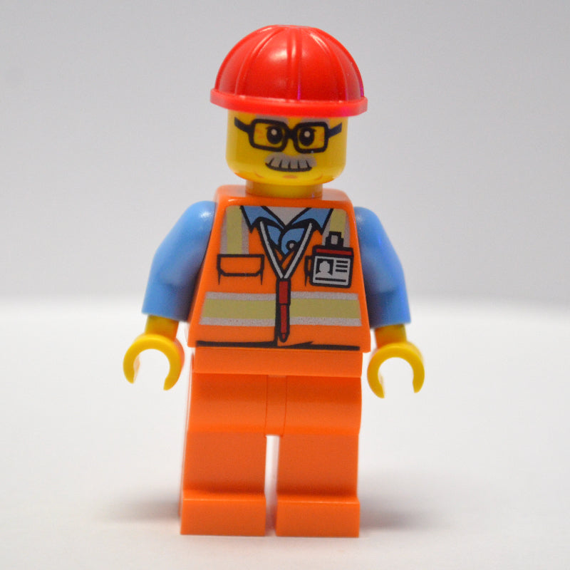 fig-007652 – Worker - Orange Safety Vest, Orange Legs, Red Helmet