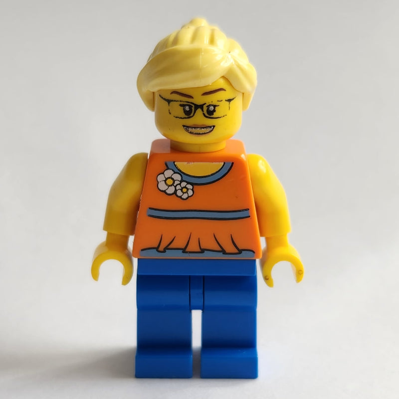 fig-007707 – Woman, Orange Halter Top with Flowers, Blue Legs, Bright Light Yellow Hair, Glasses