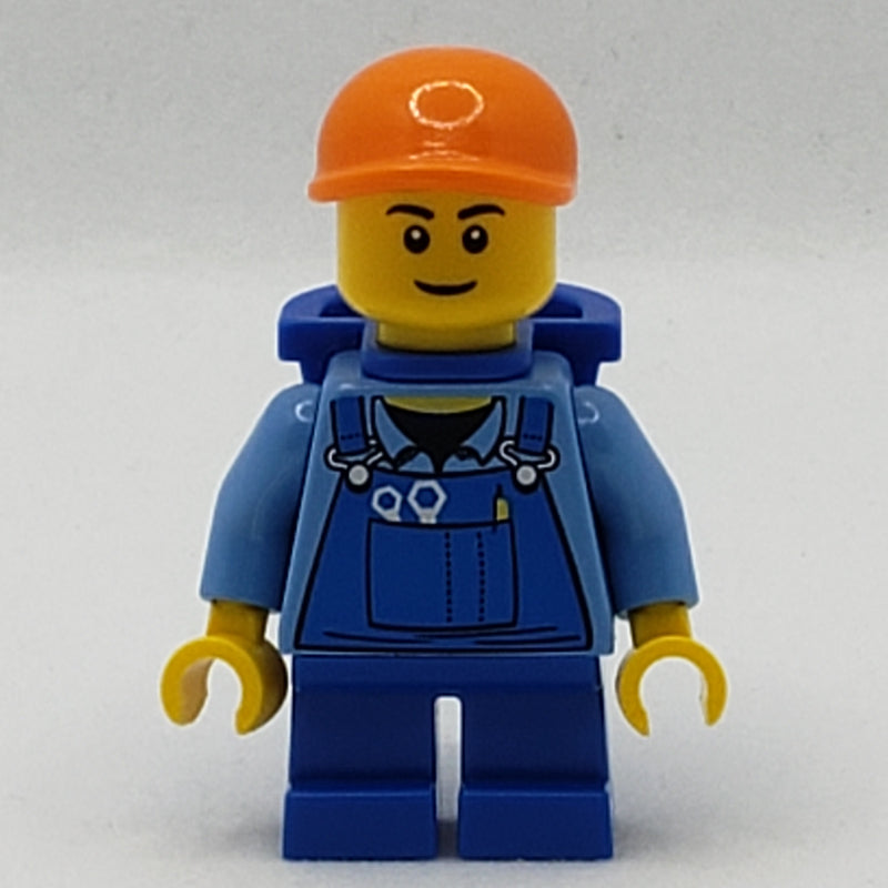 fig-007722 – Boy, Blue Overalls, Short Blue Legs, Orange Cap, Reddish Brown Eyebrows
