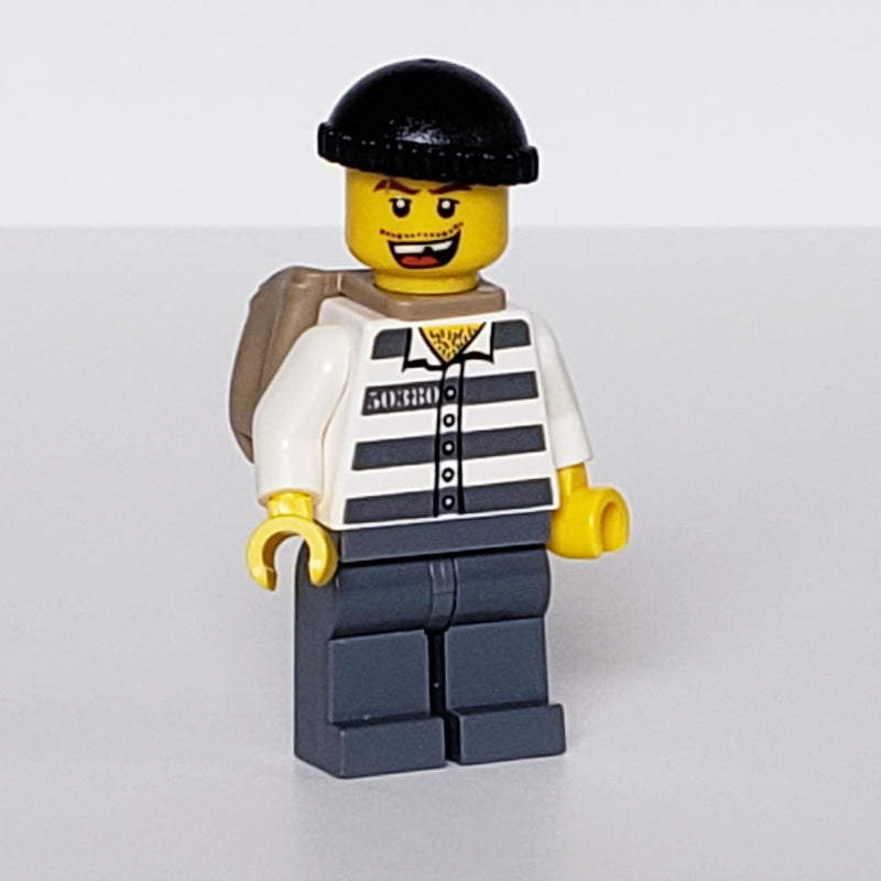 fig-007784 – Criminal, Prison Shirt with #50380, Dark Bluish Gray Legs, Black Hat, Dark Tan Back Pack, Open Mouth