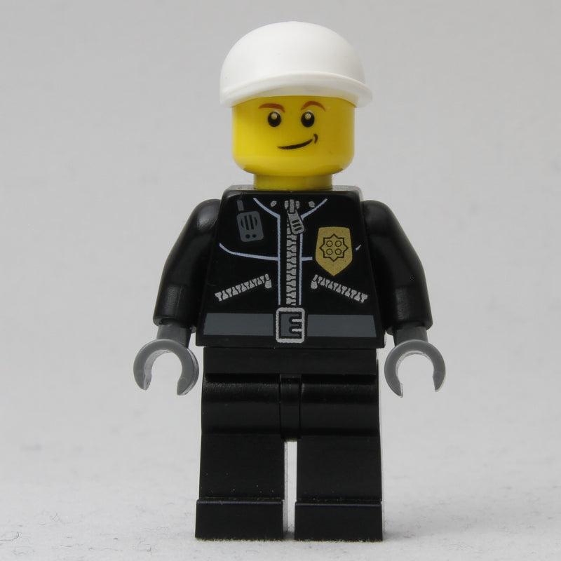 fig-007787 – Policeman, Black Jacket with Zipper, Radio, Badge, and 'POLICE' on Back, White Cap (3626b Head)