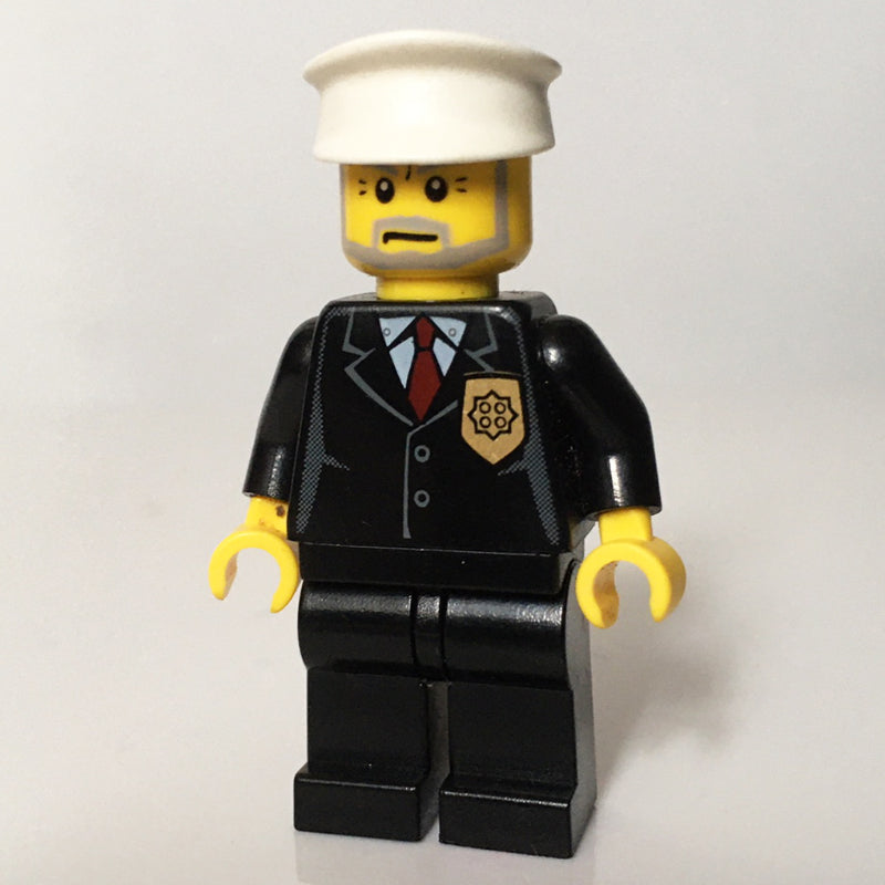fig-007801 – Policeman, Black Suit with Badge, White Hat, Gray Beard