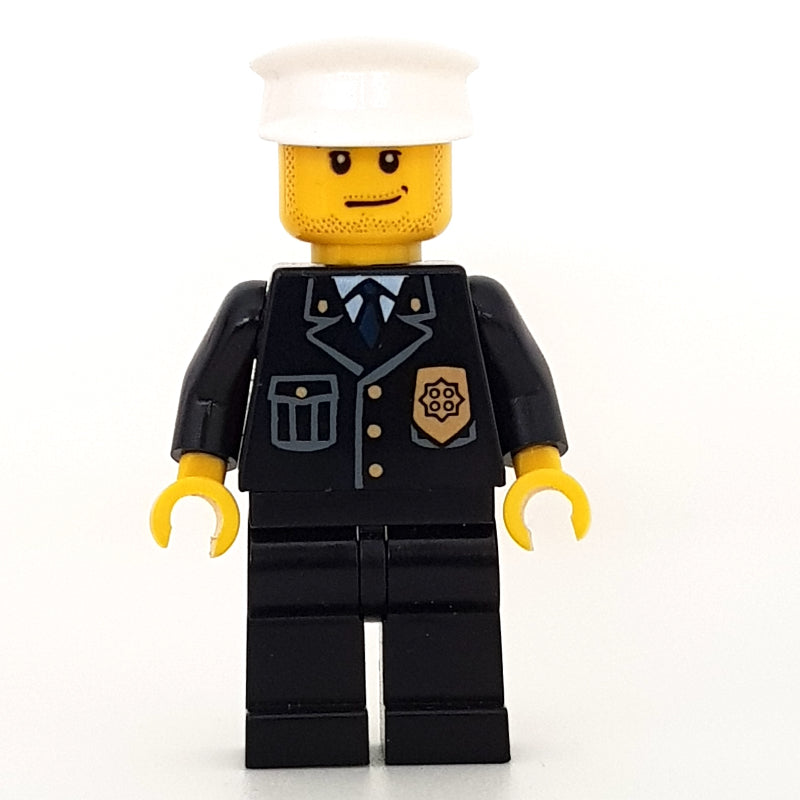 fig-007804 – Policeman, Black Suit with Badge, White Hat, Stubble