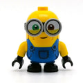 fig-007815 – Minion Bob - Blue Overall, Half Closed Eyes