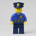 fig-007865 – Policeman, Blue Shirt with Badge and Pouches, Dark Blue Legs, Dark Blue Police Hat with Badge, Cheek Lines