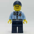 fig-007907 – Policeman, Bright Light Blue Jacket with Zipper, Radio, Badge, and Tie, Dark Blue Legs, Dark Blue Cap