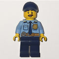 fig-007913 – Policeman, Bright Light Blue Shirt with Dark Blue Tie, Badge, and Radio on Belt, Dark Blue Cap, Moustache